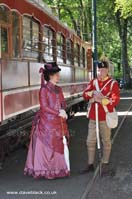 Soldier, and Maiden wearing a silk dress at the Victorian themed weekend at Laxey
