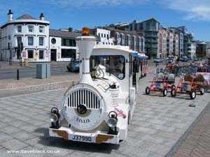 Lily the Dotto road train travells from Liberation Square to St. Brelade Parish Hall, St. Aubin