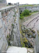 steep fortified walls of Elizabeth Castle in Jersey, Channel Isles