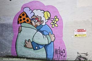 Friends Hugging By The Railway Arches On Gibb Street