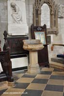 The font at Holy Trinity Church in Stratford Upon Avon