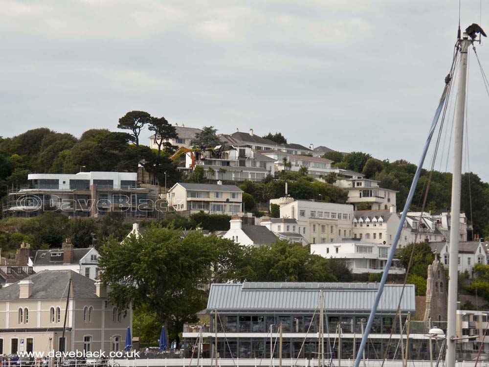 Looking Up At St. Aubin Houses on the hills around St. Aubin